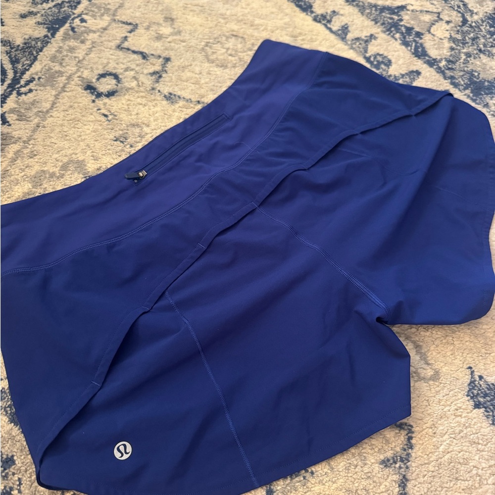 Lululemon Speed Up Mid-Rise Lined Short 4"
in Larkspur